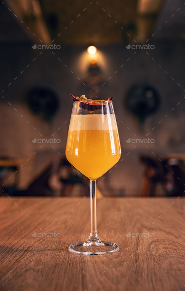 Elegant eggnog yellow passion fruit cocktail Stock Photo by grafvision